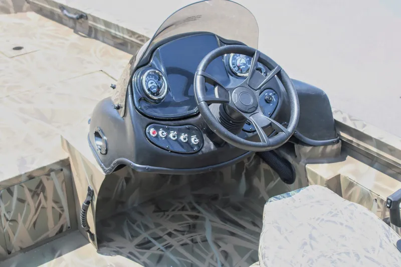 Slide: The Image of Steering console of Lowe Outlet 20 boat, model year 2025. - 6