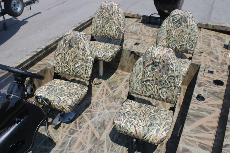 Slide: The Image of Lowe Outlet 20 boat 2025 with camouflage-patterned seats. - 7