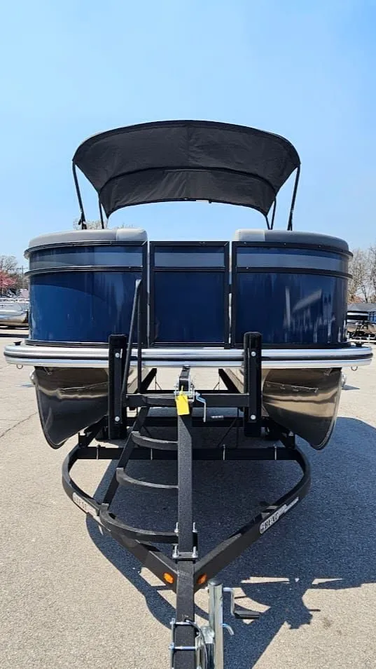 Slide: The Image of Lowe LS 190 pontoon boat 2025 on trailer, front view. - 6