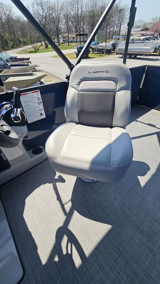 Slide: The Image of Lowe LS 190 boat seat, 2025 model, on a sunny deck. - 9