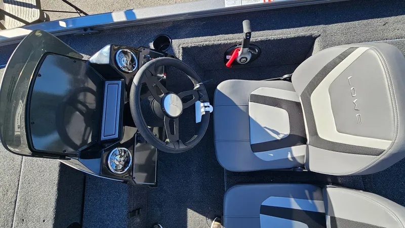 Slide: The Image of Interior view of 2026 Lowe Stinger 175C boat with steering console. - 13