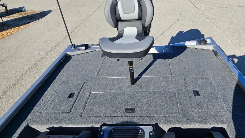 Slide: The Image of 2026 Lowe Stinger 175C boat with cushioned seat on deck. - 17