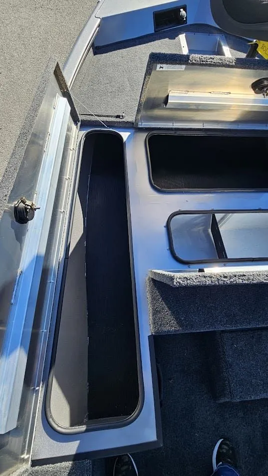 Slide: The Image of Interior view of Lowe Stinger 175C boat, model 2026. - 26