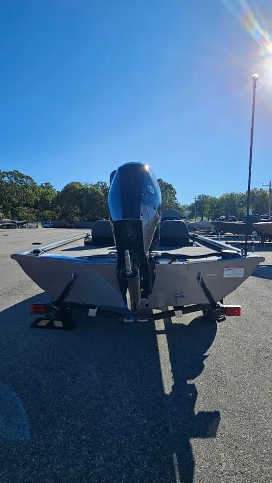 Slide: The Image of Lowe Stinger 175C 2026 boat on trailer outdoors. - 3