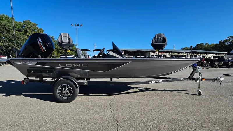 Slide: The Image of 2026 Lowe Stinger 175C boat on trailer outdoors. - 30