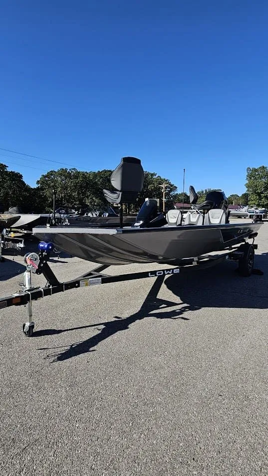 Slide: The Image of 2026 Lowe Stinger 175C boat on trailer in sunny weather. - 7