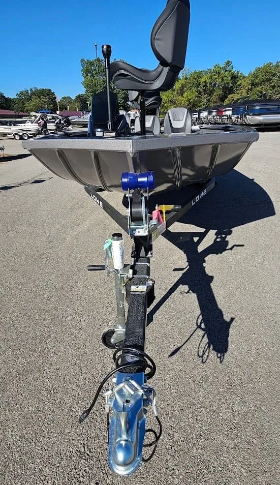 Slide: The Image of 2026 Lowe Stinger 175C boat on trailer, front view. - 9