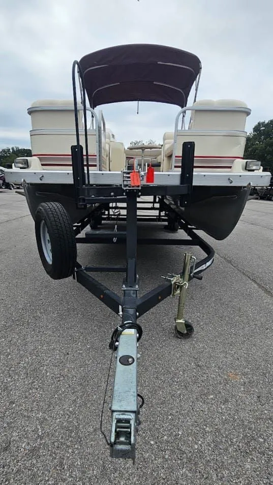Slide: The Image of 2000 Bennington 2050LX pontoon boat on trailer, front view. - 10