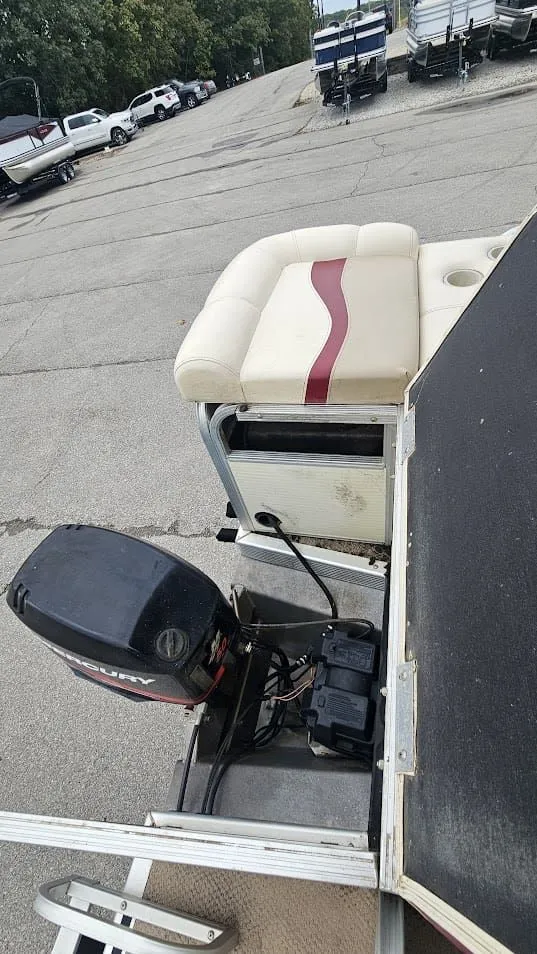 Slide: The Image of 2000 Bennington 2050LX boat with outboard motor. - 15