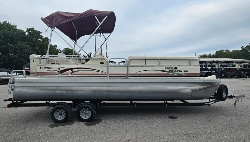 Slide: The Image of 2000 Bennington 2050LX pontoon boat on trailer. - 4