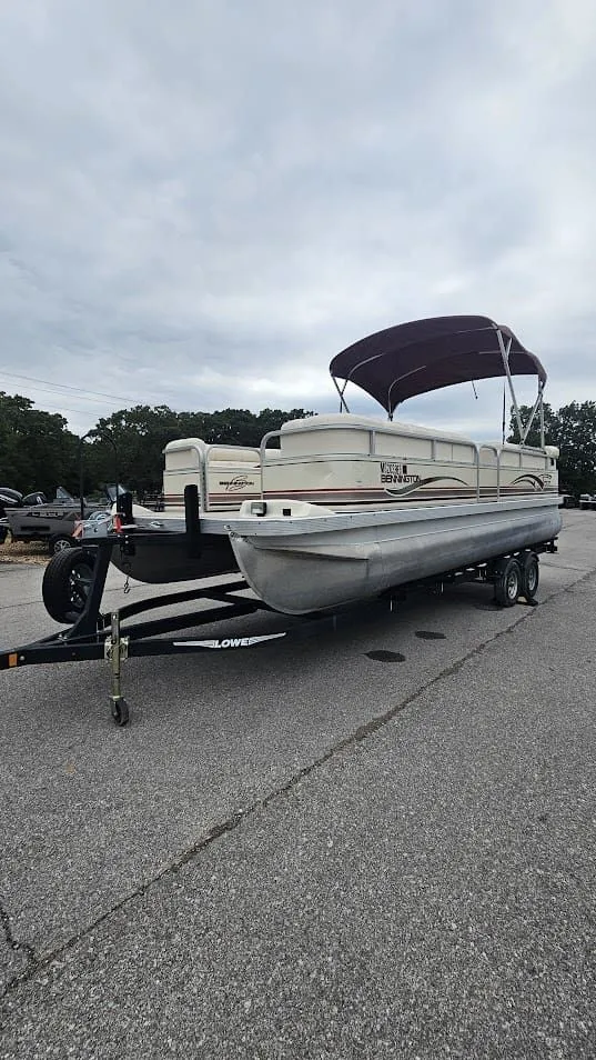 Slide: The Image of 2000 Bennington 2050LX pontoon boat on trailer. - 9