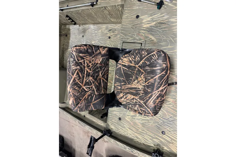 Slide: The Image of Camouflage seat on 2019 Tracker Grizzly 1754 MVX SC boat interior. - 10