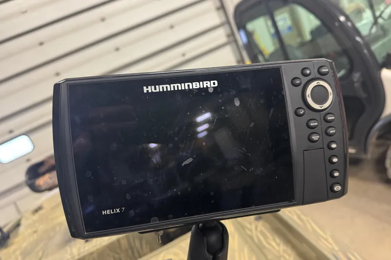 Slide: The Image of Humminbird Helix 7 fish finder on 2019 Tracker Grizzly 1754 MVX SC boat. - 14