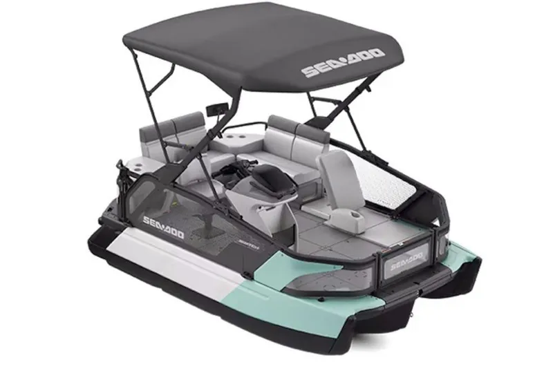 Slide: The Image of 2026 Sea-Doo Switch Sport Compact boat with canopy, modern design, and spacious seating. - 5
