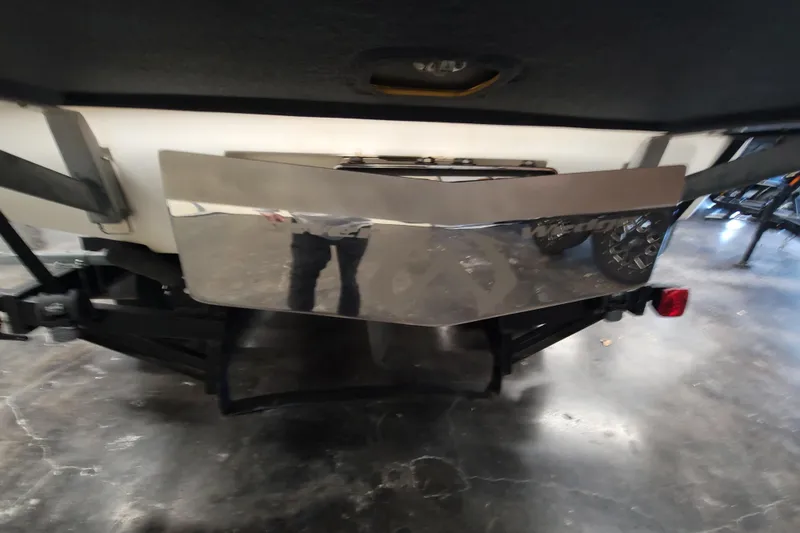 Slide: The Image of Rear view of a 2006 Malibu Wakesetter 23 LSV boat on a trailer. - 7