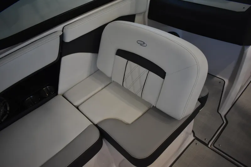 Slide: The Image of 2026 Regal 2000 ES boat interior seating with elegant white upholstery. - 11