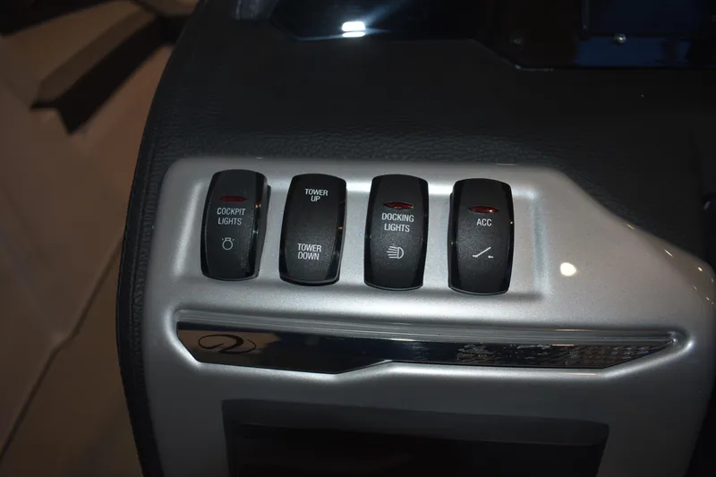Slide: The Image of Control panel of a 2026 Regal 2000 ES boat with labeled switches. - 17