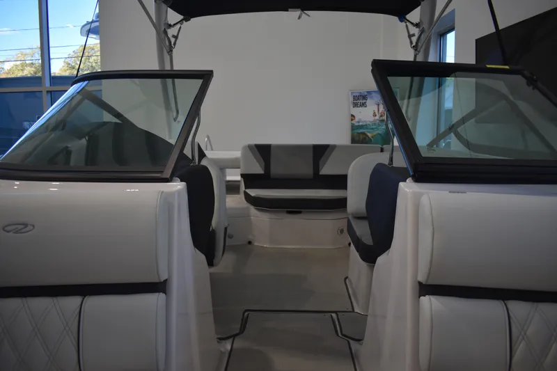 Slide: The Image of 2026 Regal 2000 ES boat interior with sleek seating and modern design. - 25