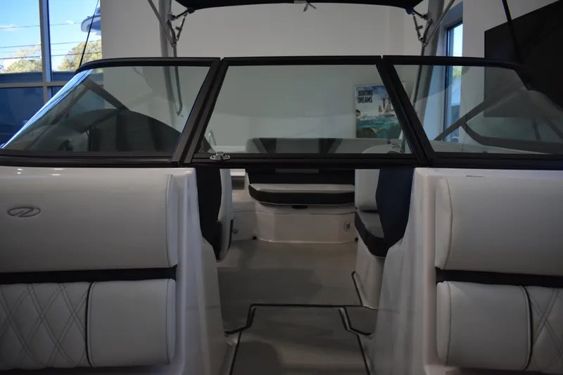 Slide: The Image of 2026 Regal 2000 ES boat interior with sleek seating and modern design. - 26