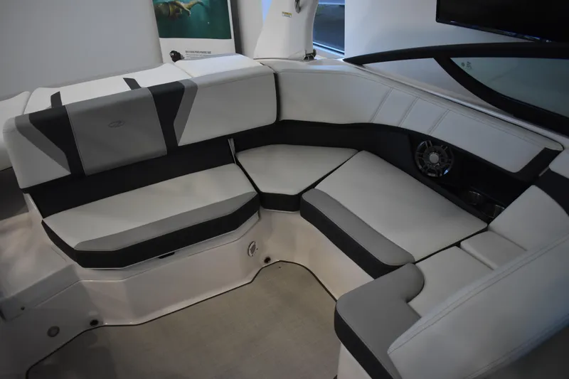 Slide: The Image of 2026 Regal 2000 ES boat interior with sleek, modern seating and integrated speaker system. - 8