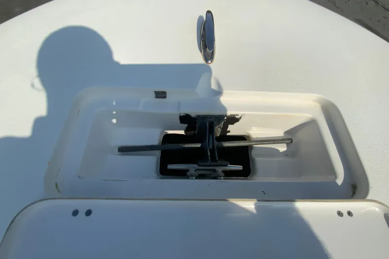 Slide: The Image of Anchor compartment of 2014 Tidewater 250 CC Adventure boat, featuring a sleek design. - 21