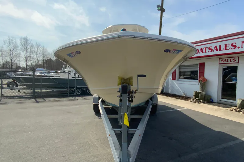 Slide: The Image of 2014 Tidewater 250 CC Adventure boat on trailer at dealership. - 3