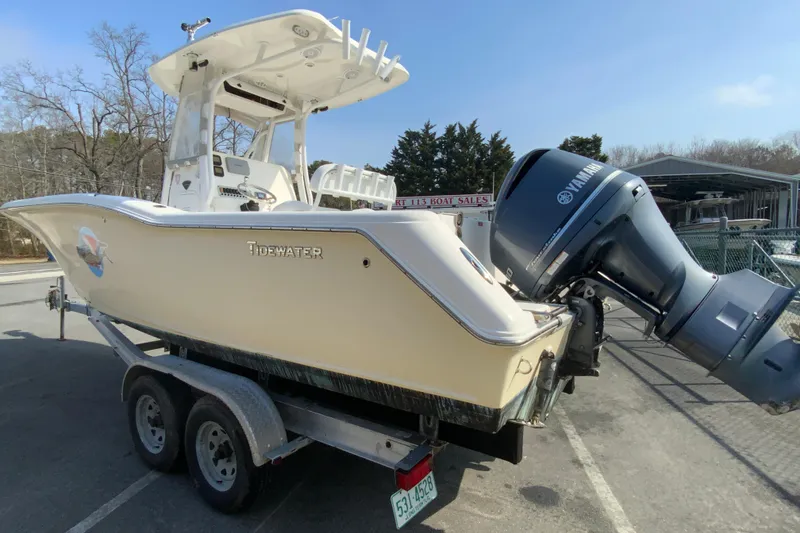 Slide: The Image of 2014 Tidewater 250 CC Adventure boat on trailer with Yamaha outboard motor. - 6