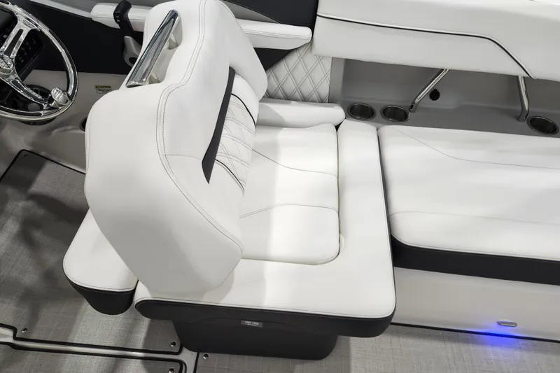 Slide: The Image of Luxurious interior of 2025 Regal LX2 boat with plush white seating and modern design. - 12