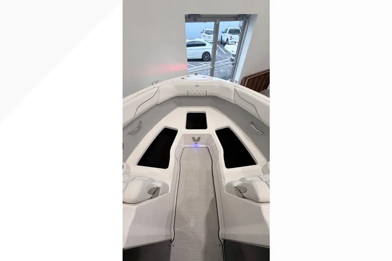 Slide: The Image of 2025 Regal LX2 boat interior with sleek seating and modern design. - 5