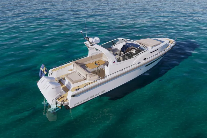 Slide: The Image of Manufacturer Provided Image: Nimbus Weekender 11 2026 on clear water, luxurious design. - 5