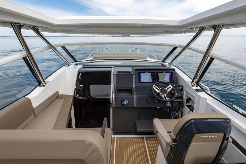 Slide: The Image of Manufacturer Provided Image: Interior of Nimbus Weekender 11 boat, 2026 model, featuring modern cockpit. - 8