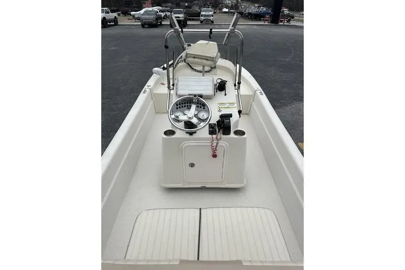 Slide: The Image of 2014 Carolina Skiff JV Series 17 SS/TH/CC boat interior with steering console. - 7