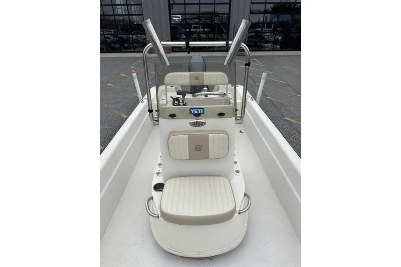 Slide: The Image of 2014 Carolina Skiff JV Series 17 SS/TH/CC boat with center console and seating. - 8