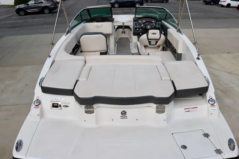 Slide: The Image of 2017 Chaparral 227 SSX boat interior with seating and dashboard view. - 13