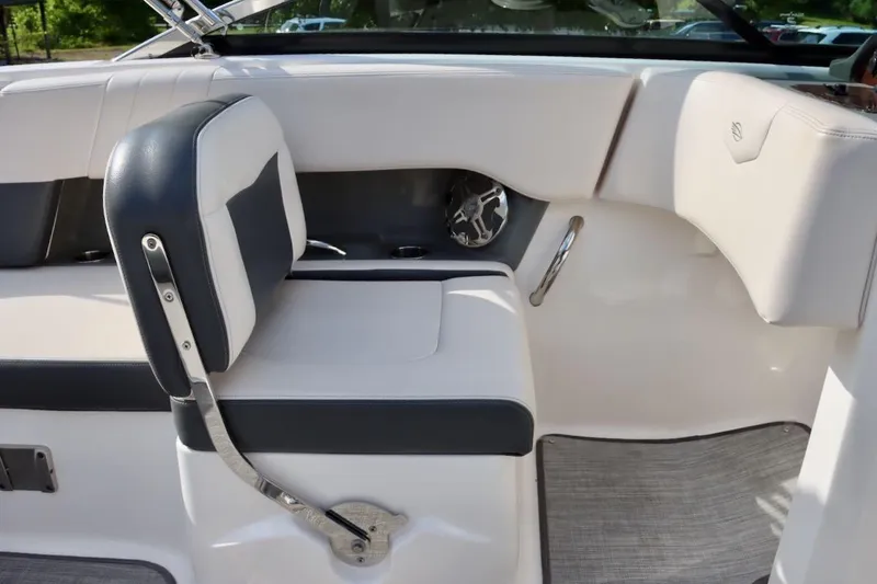 Slide: The Image of 2017 Chaparral 227 SSX boat interior with white and gray seating. - 20