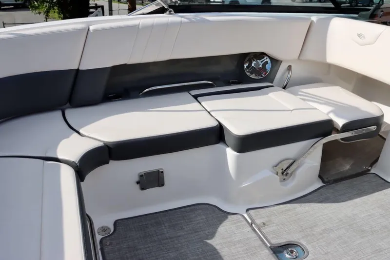 Slide: The Image of 2017 Chaparral 227 SSX boat interior with cushioned seating and modern design. - 21