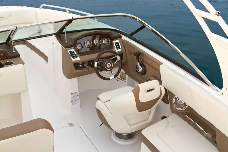 Slide: The Image of Manufacturer Provided Image: 2017 Chaparral 227 SSX boat interior with steering wheel and seating. - 5