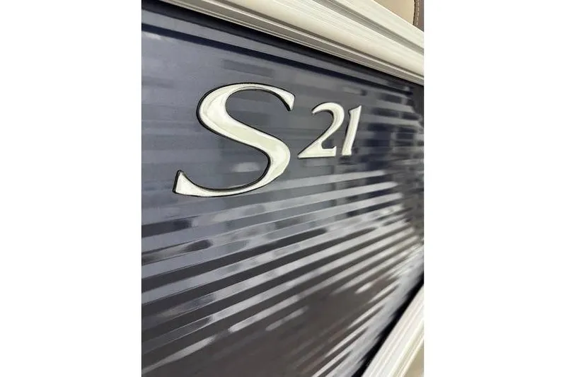 Slide: The Image of Close-up of 2026 Bennington 21 SSR Quad Bench boat model emblem. - 11