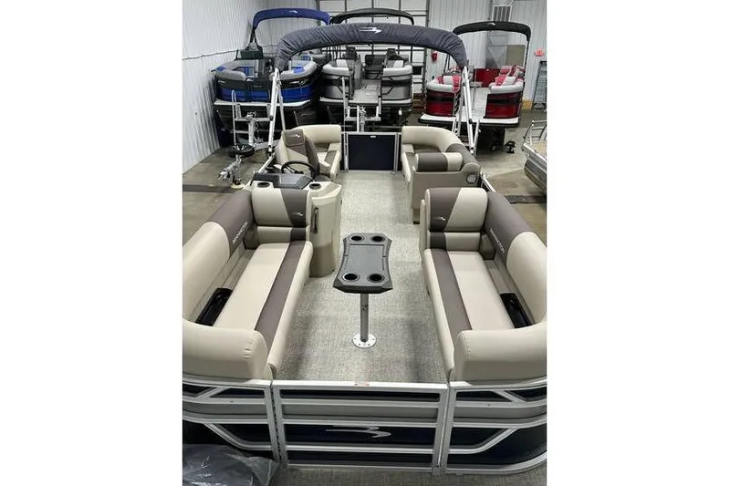 Slide: The Image of 2026 Bennington 21 SSR Quad Bench pontoon boat with spacious seating, in stock. - 12