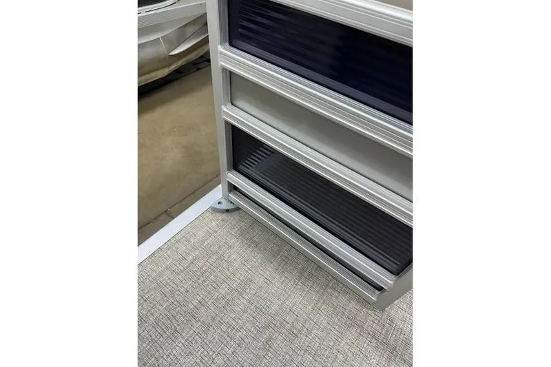 Slide: The Image of 2026 Bennington 21 SSR Quad Bench interior detail, showcasing sleek design and modern materials. - 34