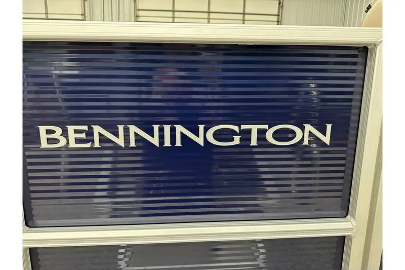 Slide: The Image of Bennington 21 SSR Quad Bench 2026 model, blue panel with logo, in stock. - 37