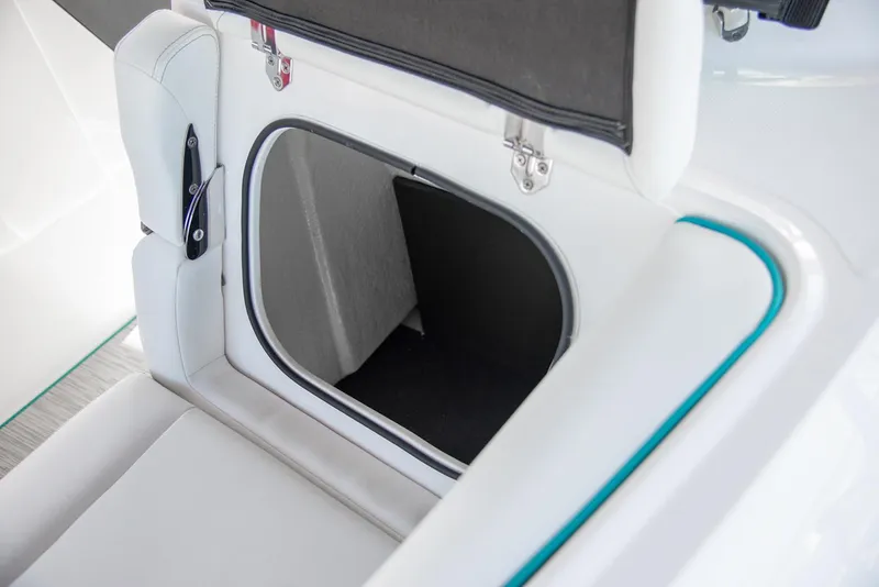Slide: The Image of Luxurious white seating with blue LED lighting in 2025 Regal LX4 boat. - 9