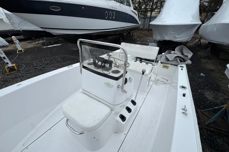 Slide: The Image of 2016 Sportsman Island Reef 17 Center Console boat in storage yard. - 10