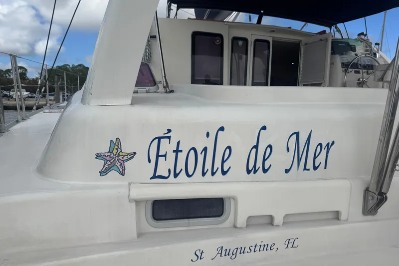 Slide: The Image of Leopard 42 catamaran "Étoile de Mer" docked in St. Augustine, FL, 2002 model. - 11