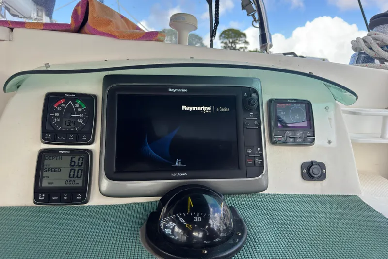 Slide: The Image of Leopard 42 yacht dashboard with Raymarine navigation system, 2002 model. - 16