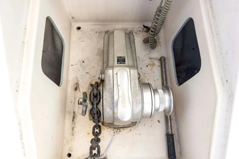 Slide: The Image of Anchor windlass in a Leopard 42 yacht, 2002 model, with chain and controls. - 62