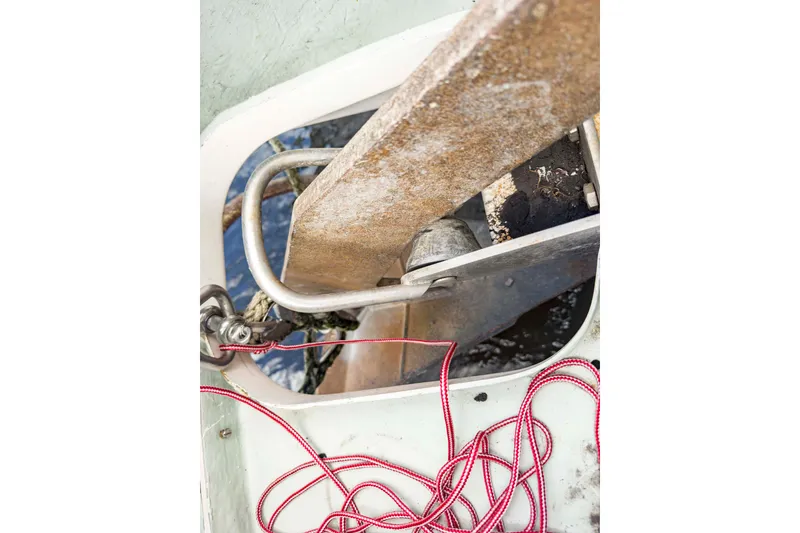 Slide: The Image of Close-up of a Leopard 42 boat anchor system, featuring ropes and metal components. - 65