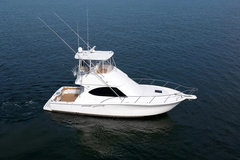 Slide: The Image of 2007 Tiara Yachts 3900 Convertible cruising on open water. - 24