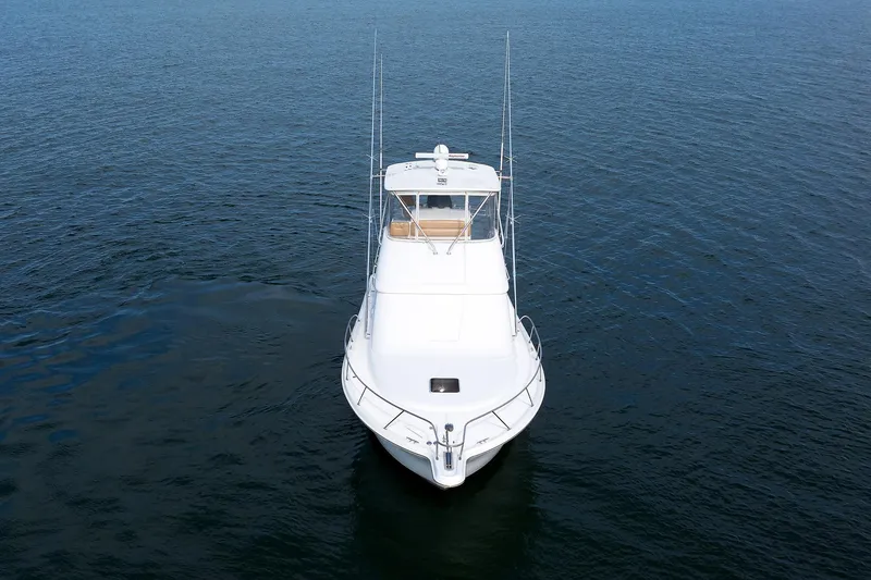 Slide: The Image of 2007 Tiara Yachts 3900 Convertible on open water, front view. - 26