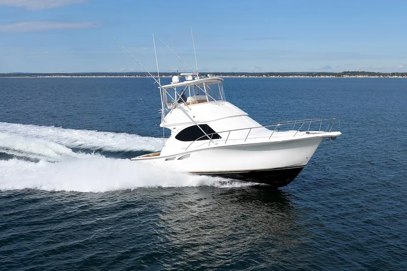 Slide: The Image of 2007 Tiara Yachts 3900 Convertible cruising on open water. - 34